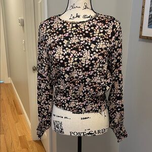 Floral blouse with elastic waistband by Rolla’s of Australia. 
Size M